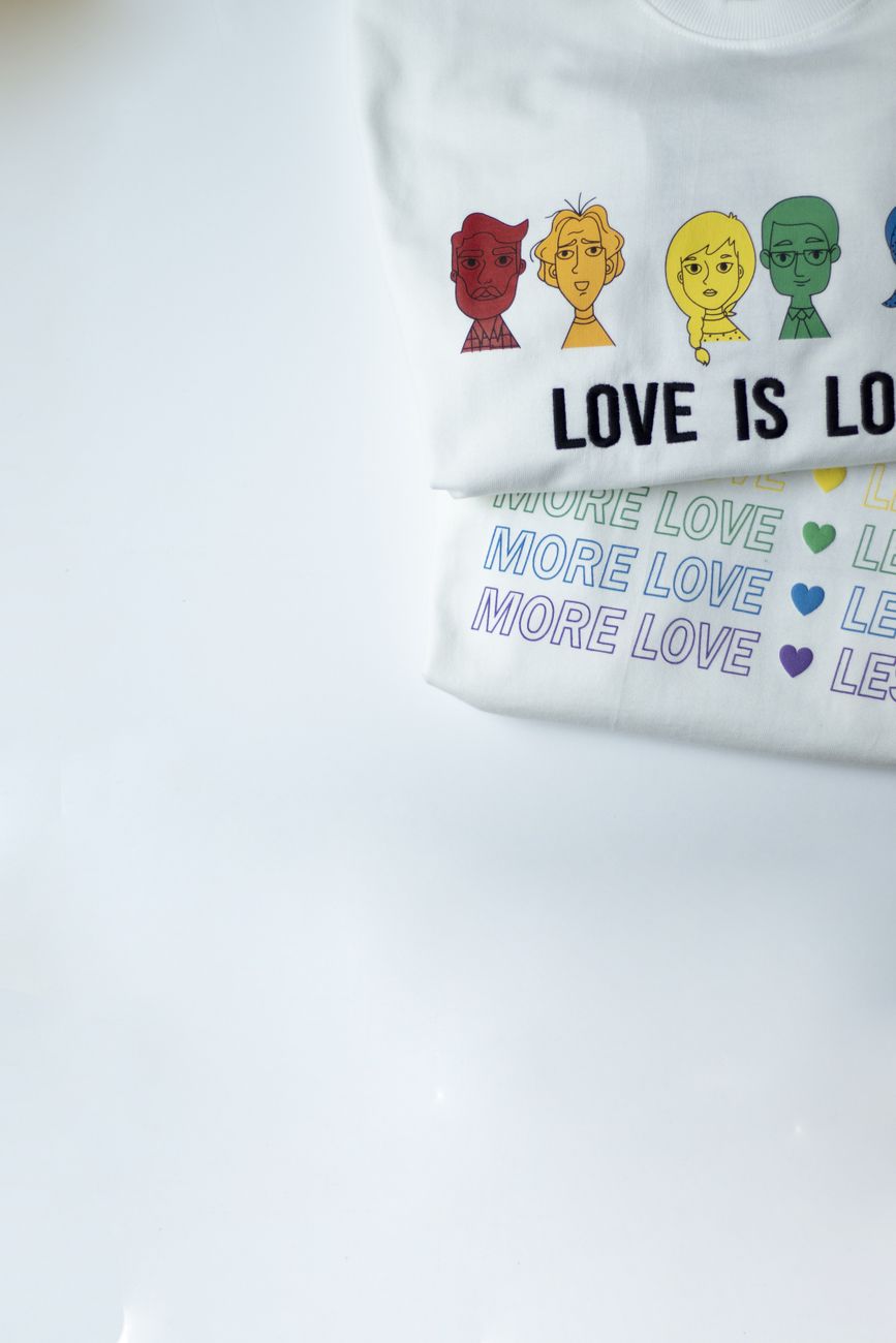 A white t-shirt with a large printed slogan