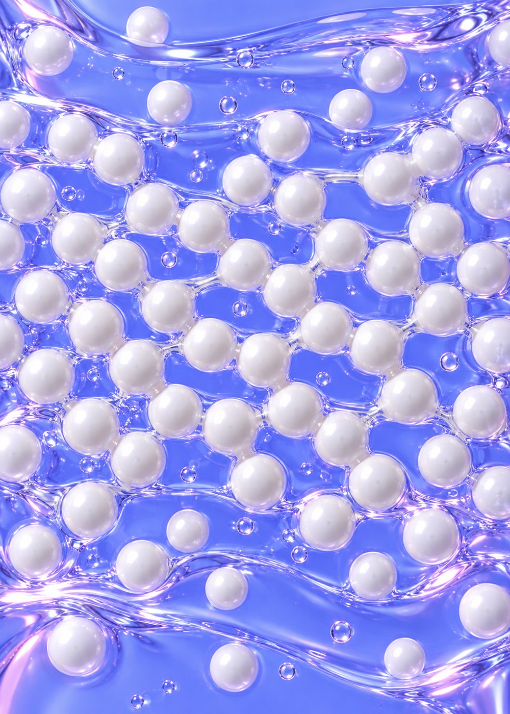 Glossy white ceramide beads suspended in clear gel on a periwinkle surface