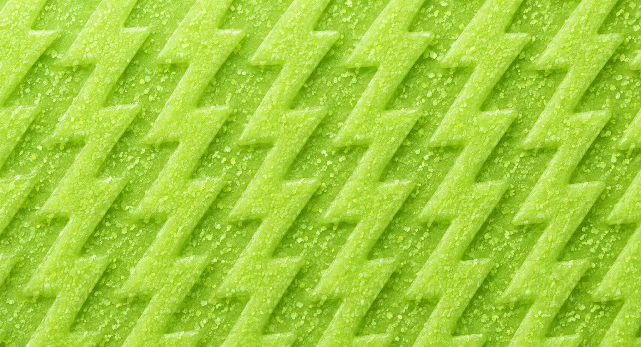 Lime-green zigzag lightning pattern, the Sour Storm realm backdrop