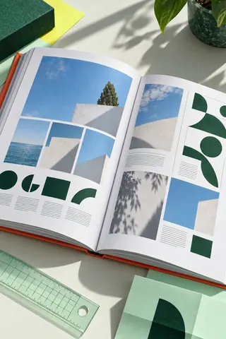 Open book layout with a chair photo — Cielo Books, Editorial