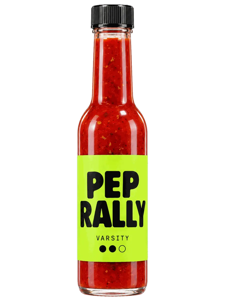 Varsity bottle with a lime-green label and smoky red chipotle sauce