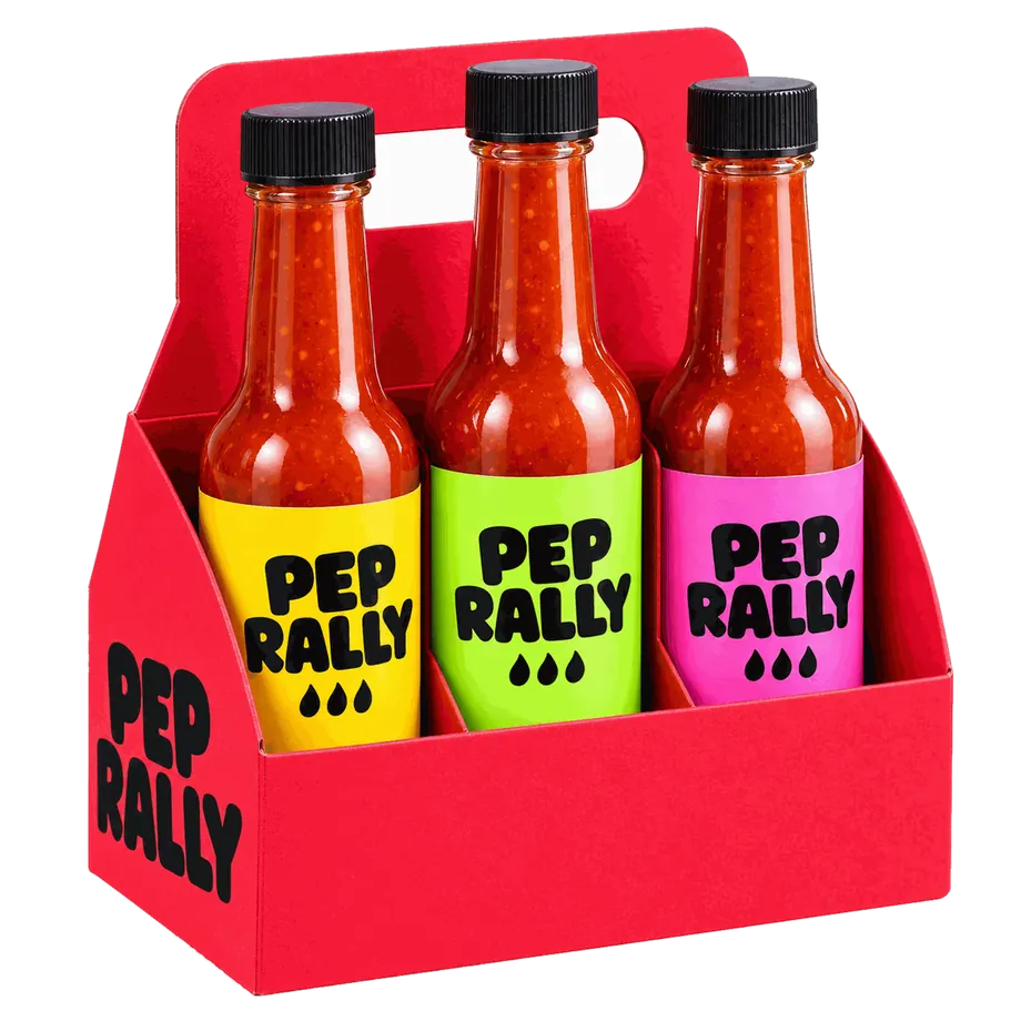 The Pep Rally 3-pack: three bottles in yellow, green and pink labels in a red carry box